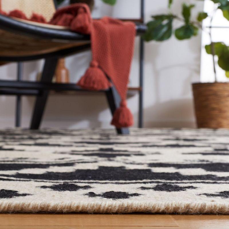 Aderinsola Flatweave Wool Southwestern Rug