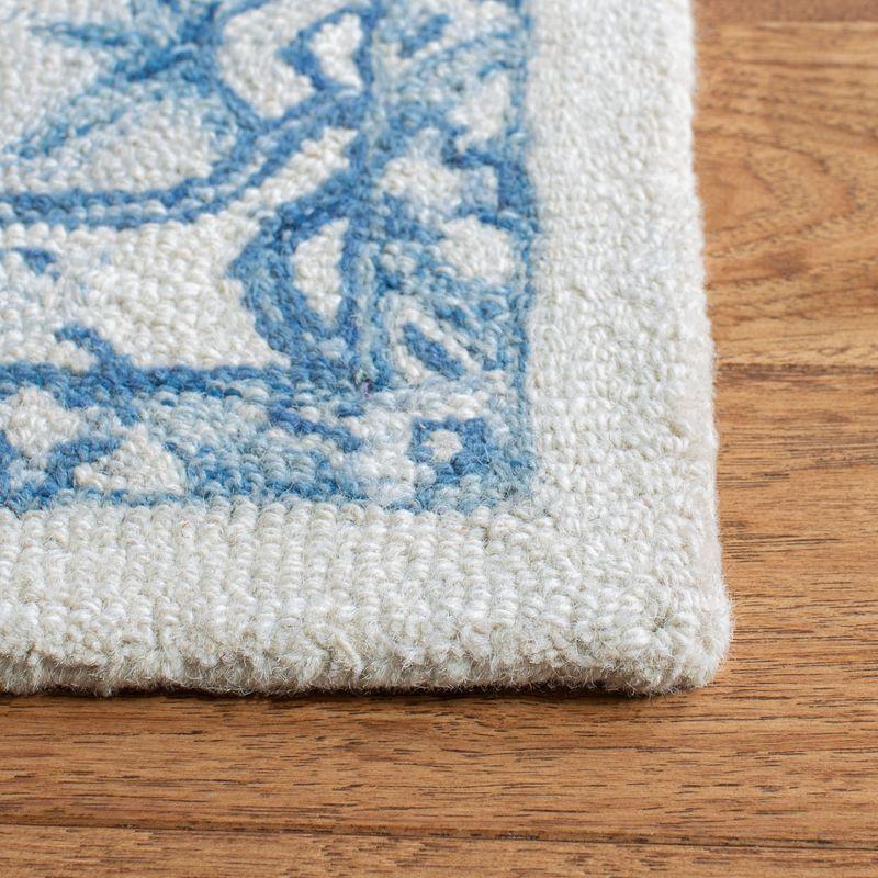Ivory and Blue Hand-Tufted Wool Rectangular Rug, 5' x 8'