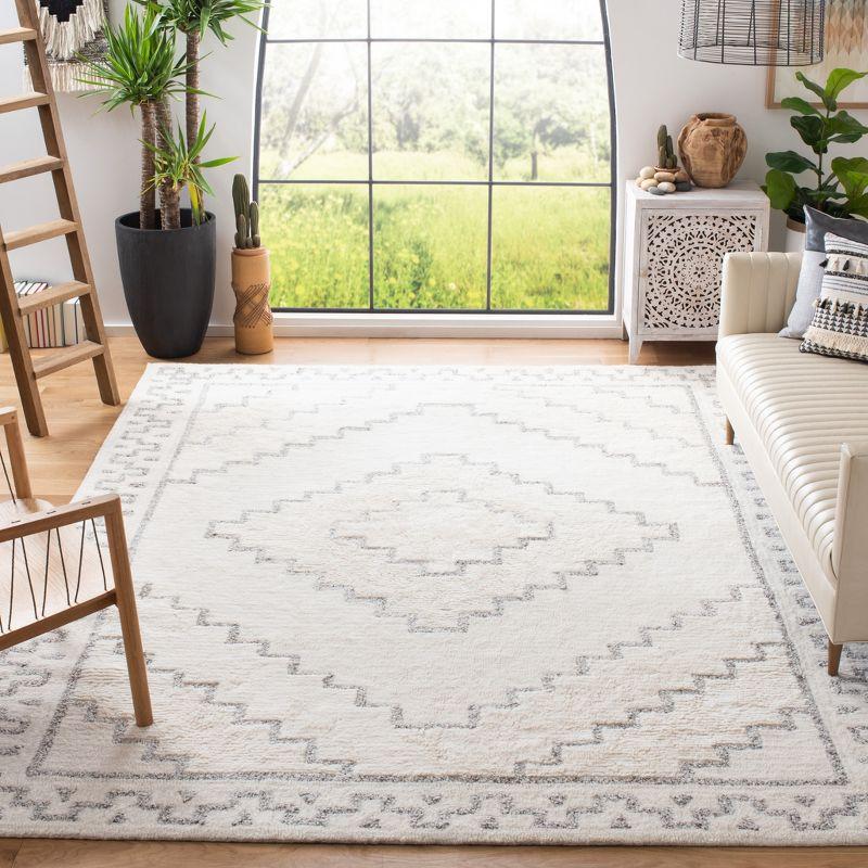 Ivory Shag Elegance 9' x 12' Hand-Tufted Wool Blend Area Rug