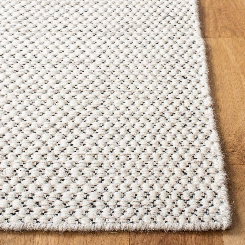 Ivory Flat Woven Wool 6' x 9' Area Rug