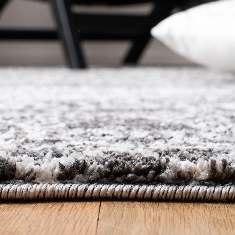 Berber-Inspired Black and Ivory Geometric Synthetic Area Rug