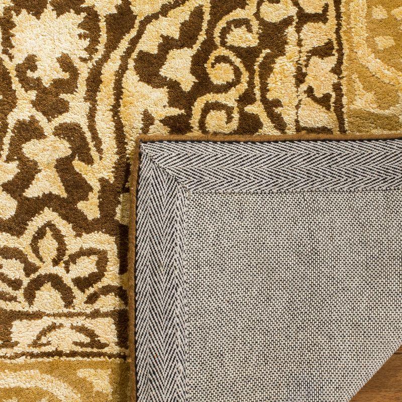 Silk Road SKR213 Hand Tufted Area Rug - Brown/Ivory - 8'3"x11' - Safavieh.