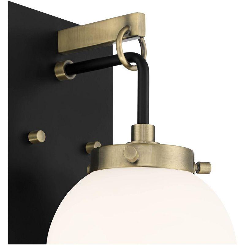 Modern Black and Brass Wall Sconce with Frosted Glass Globe