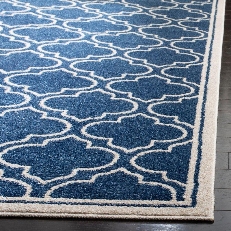 Navy and Ivory Geometric Pattern Low Pile Area Rug