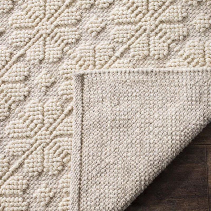 Ivory Hand-Woven Wool and Synthetic 4' x 6' Area Rug