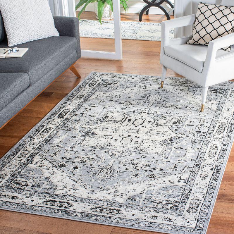 Elegant Heirloom 9' x 12' Grey and Black Synthetic Area Rug