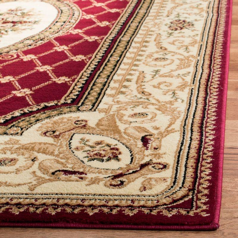 Red and Ivory Medium Pile Synthetic Traditional Area Rug