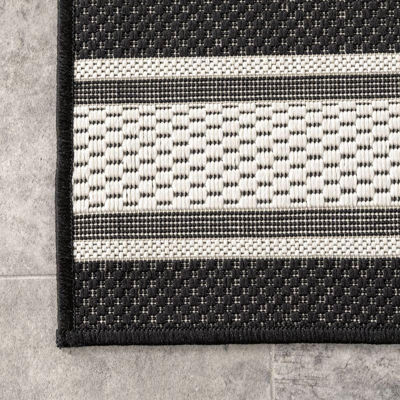 Black and White Striped Synthetic 5' x 8' Indoor/Outdoor Rug