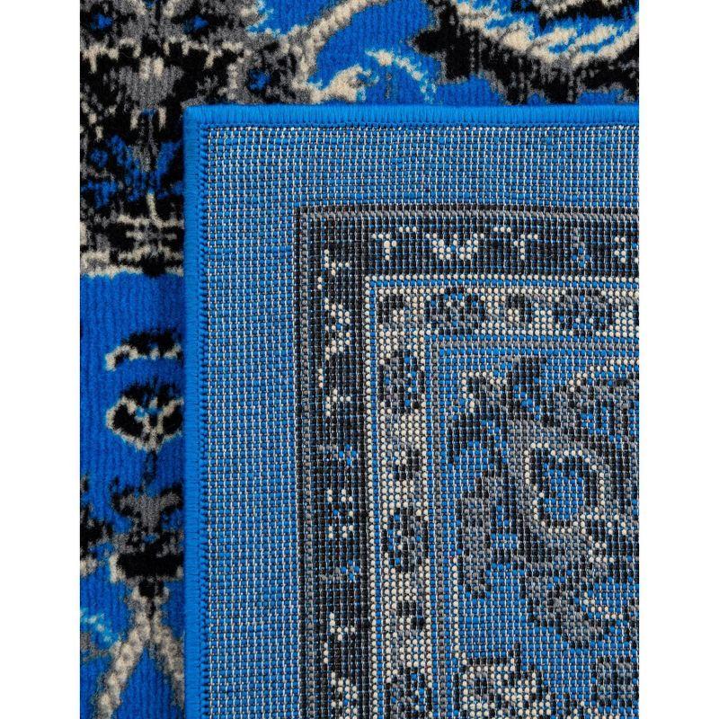 Rectangular 6' x 9' Blue and Ivory Synthetic Easy-Care Area Rug