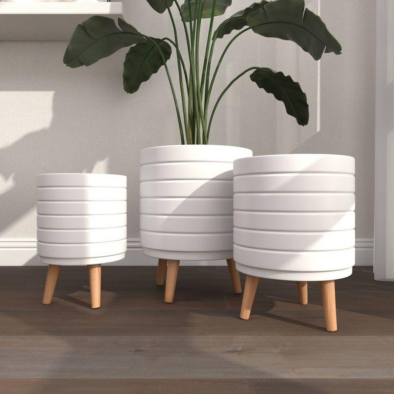 Cosmoliving By Cosmopolitan Set Of 3 White Wood Planter 14", 16", 18"H