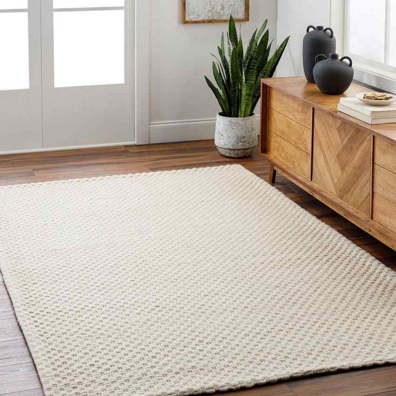 Ivory Woven Rectangular 6' x 9' Area Rug