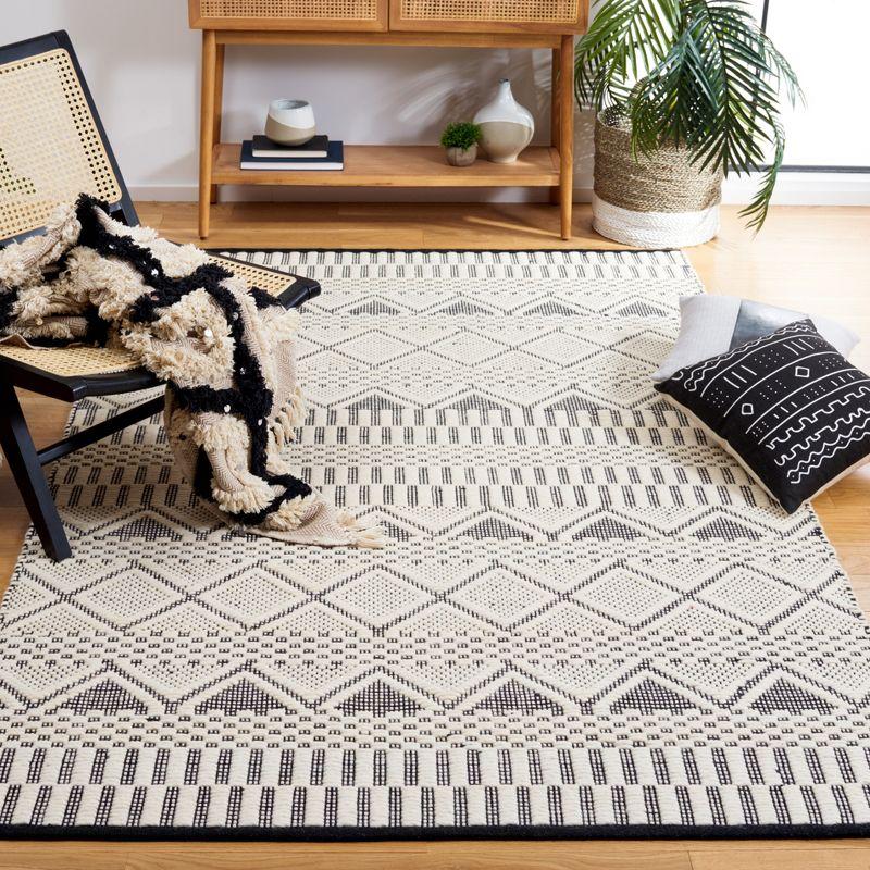 Ivory and Black Geometric Wool 3' x 5' Area Rug