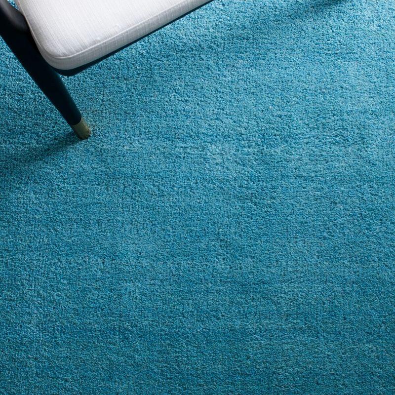 Moreau Hand Tufted Wool Solid Color Rug