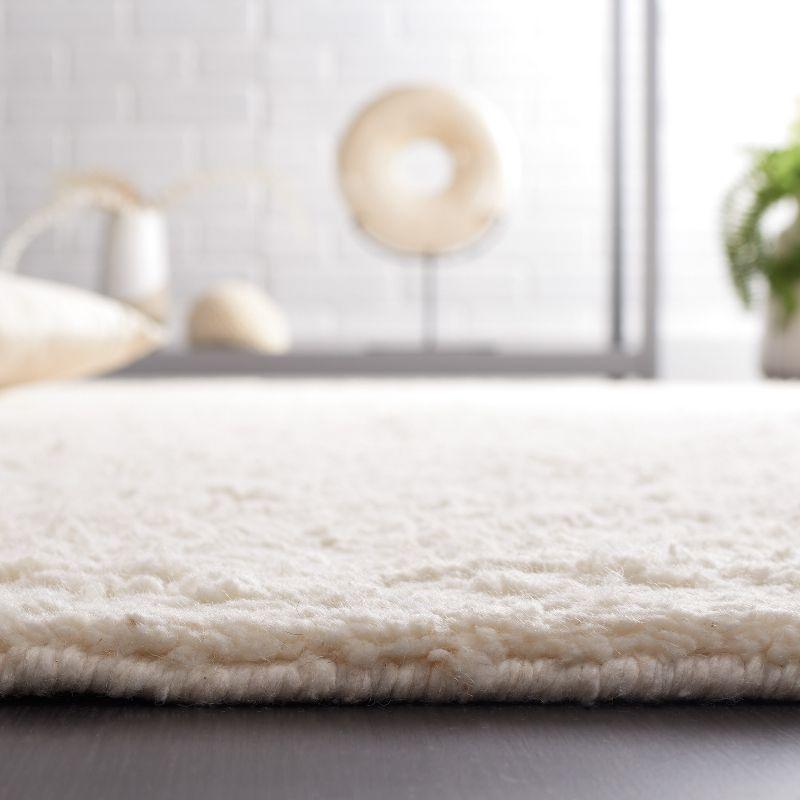 Ivory Hand-Tufted Wool Shag Area Rug, 5' x 8'