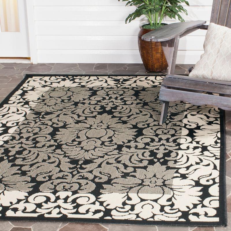 Reversible Black/Sand Synthetic Rectangular Easy-Care Rug, 4' x 5'7"