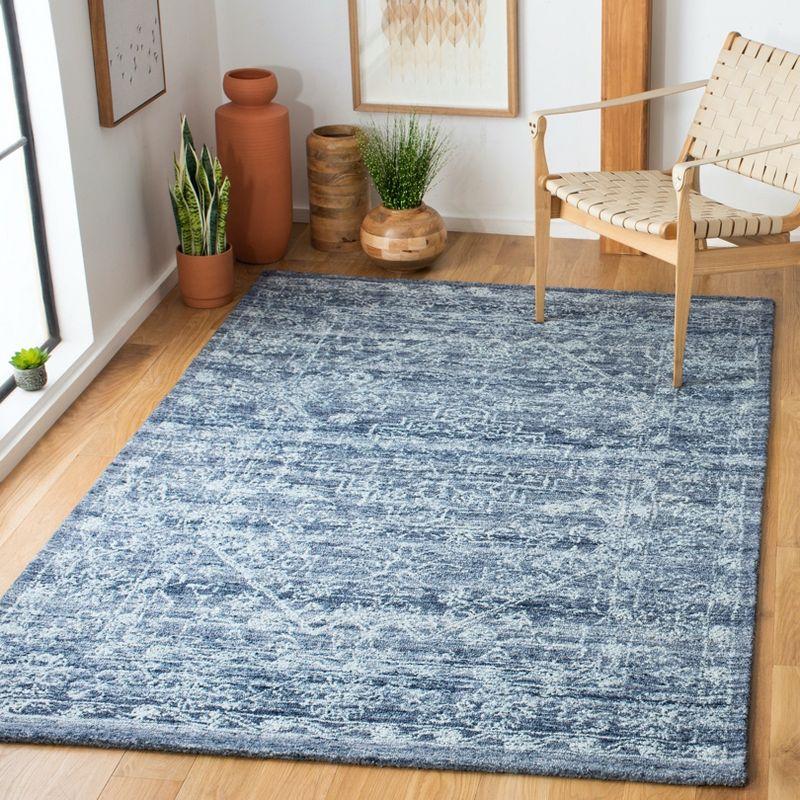 Blue Hand-Tufted Wool and Synthetic 4' x 6' Area Rug