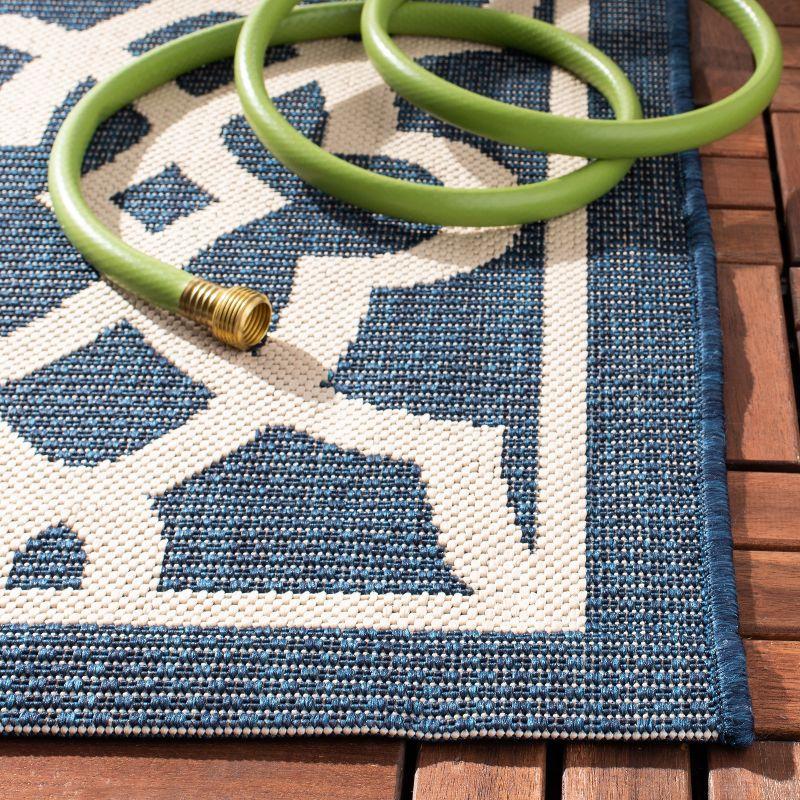 Navy and Beige Rectangular Synthetic Indoor/Outdoor Rug 5' x 7'