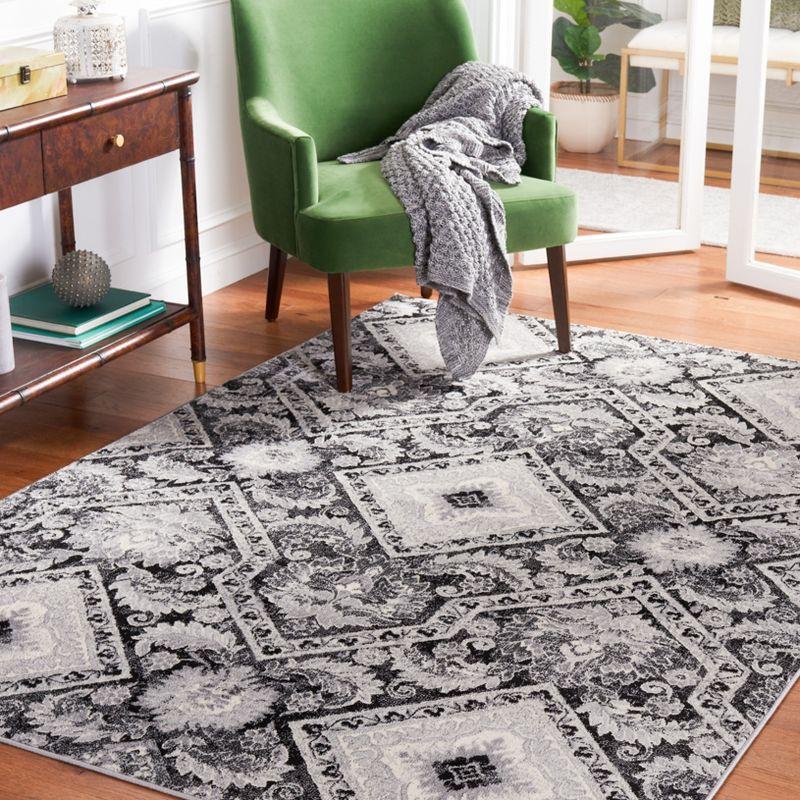 Brentwood Black and Ivory Square Synthetic Area Rug