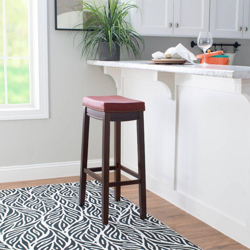 32" Dark Brown Wood Barstool with Red Faux Leather Saddle Seat