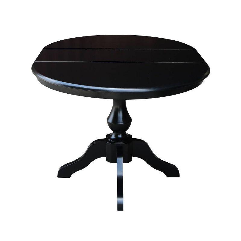 Elegant Black Wood Round Extendable Dining Table with Pedestal Base