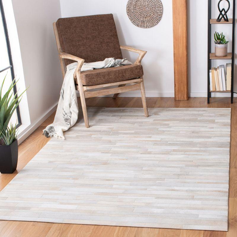 Hand-Woven Geometric Gray Cowhide Area Rug - 4' x 6'