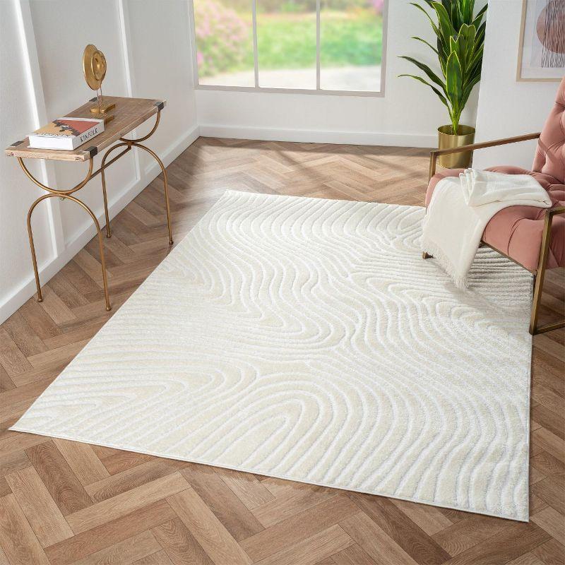 Cream Geometric Swirl 5' x 7' Synthetic Area Rug