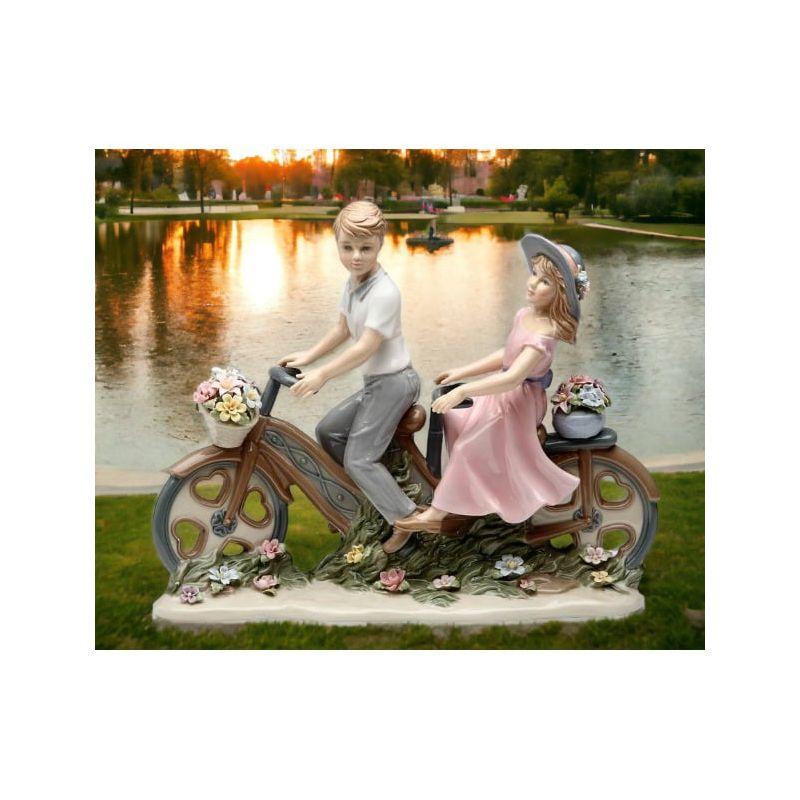 Kevins Gift Shoppe Ceramic Young Couple Sharing Bike Figurine