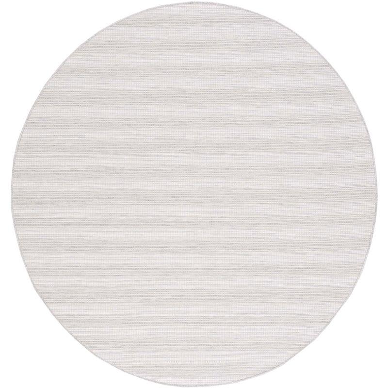 Ivory and Grey Round Synthetic Indoor/Outdoor Rug