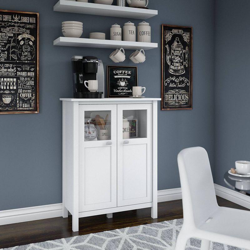 Elegant White Broadview Bar Cabinet with Glass Accents and Wine Storage