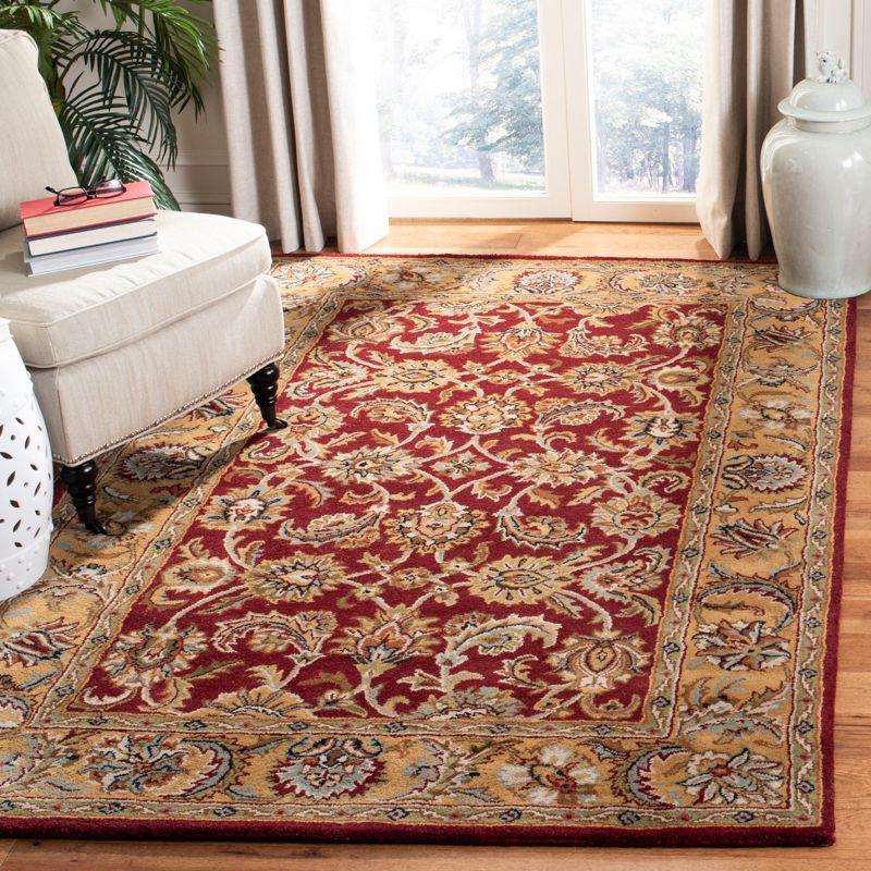 Regal Elegance Round Red and Gold 5' Wool Area Rug