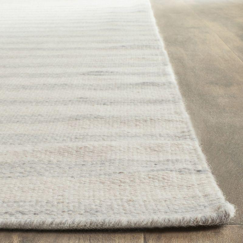 Dhurries DHU575 Hand Woven Flat Weave Area Rug Light Blue / Ivory 8' X 10' - Safavieh.