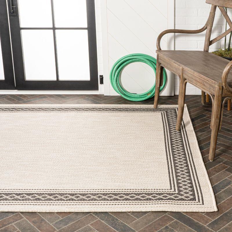 5' x 8' Lucia Classic Diamond Border Indoor/Outdoor Area Rug, Cream/Black - JONATHAN Y