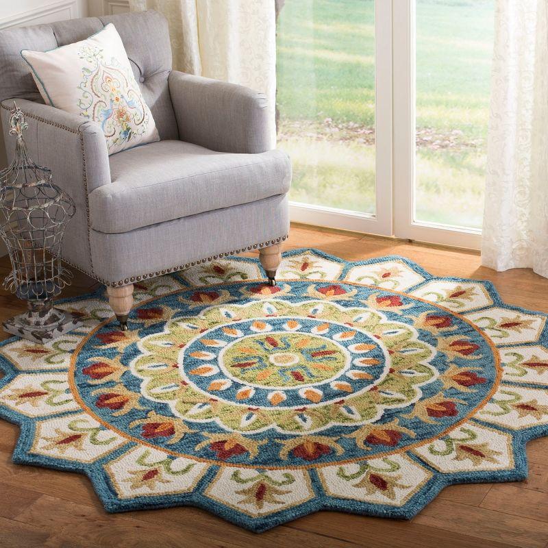 Handmade Tufted Round Blue and Ivory Floral Wool Rug