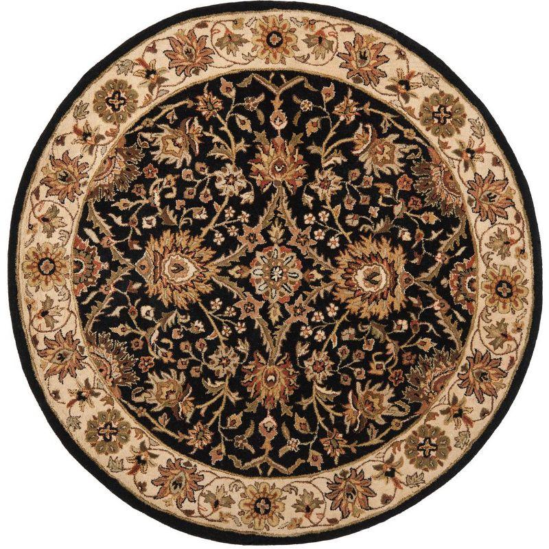 Handmade Black and Ivory Round Wool Tufted Area Rug