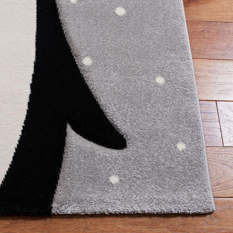 Whimsical Penguin Parade 8' x 10' Light Grey Synthetic Area Rug for Kids