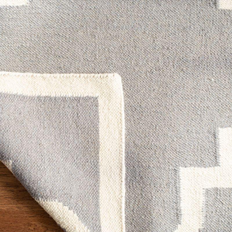 Dhurries DHU633 Hand Woven Area Rug - Grey/Ivory - 5'x8' - Safavieh.