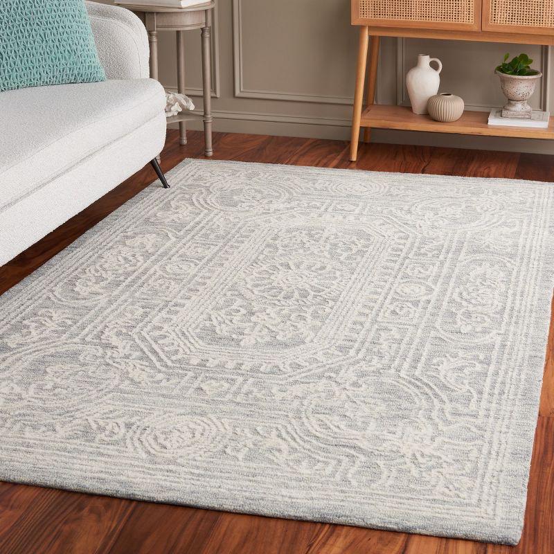 Ivory and Grey Hand Tufted Wool 4' x 6' Area Rug