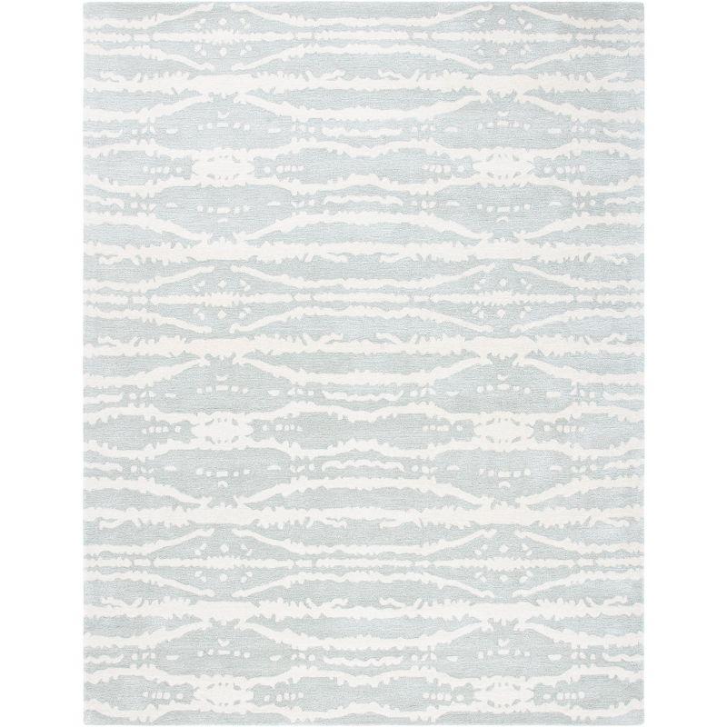 Soho SOH656 Hand Tufted Area Rug  - Safavieh