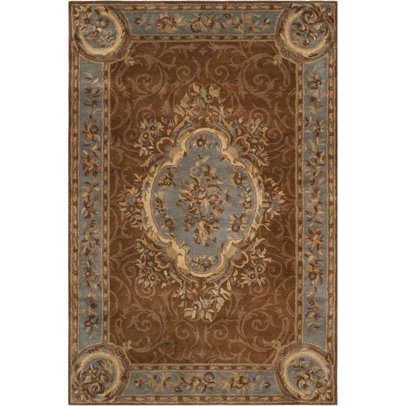Empire EM409 Hand Tufted Wool Area Rug - Blue/Brown- 6' X 9' - Safavieh.
