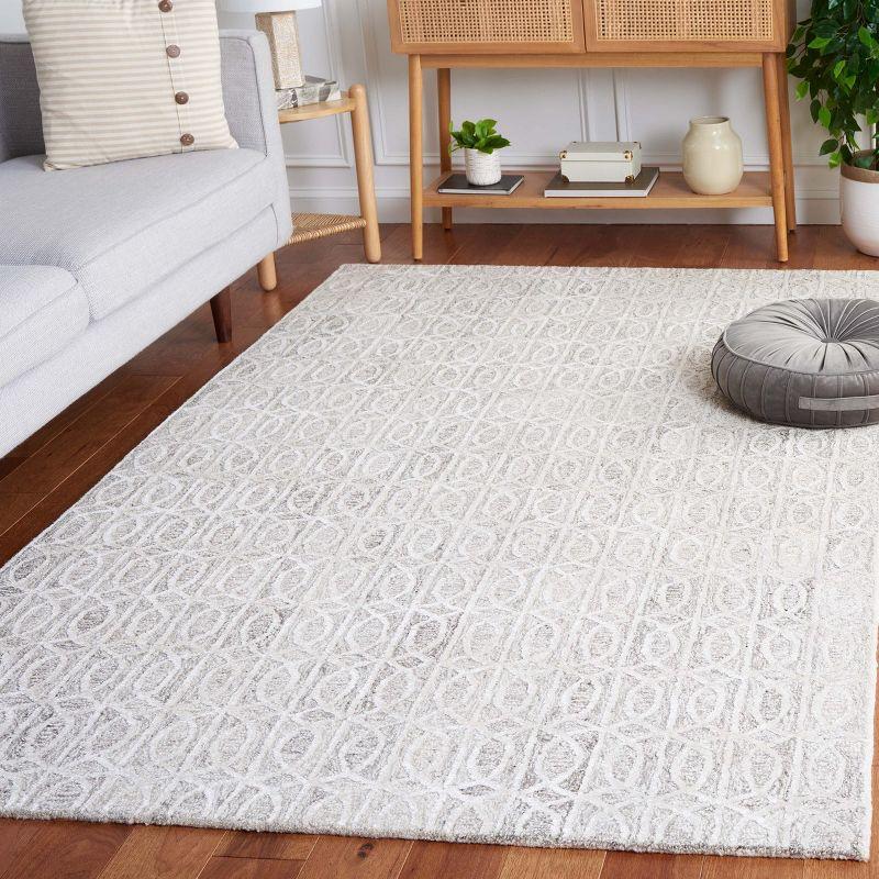 Natural Ivory Tufted Rectangular Wool Area Rug 6' x 9'