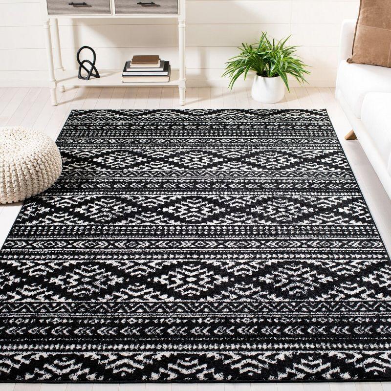 Modern Geometric 4' x 6' Black/Ivory Synthetic Area Rug