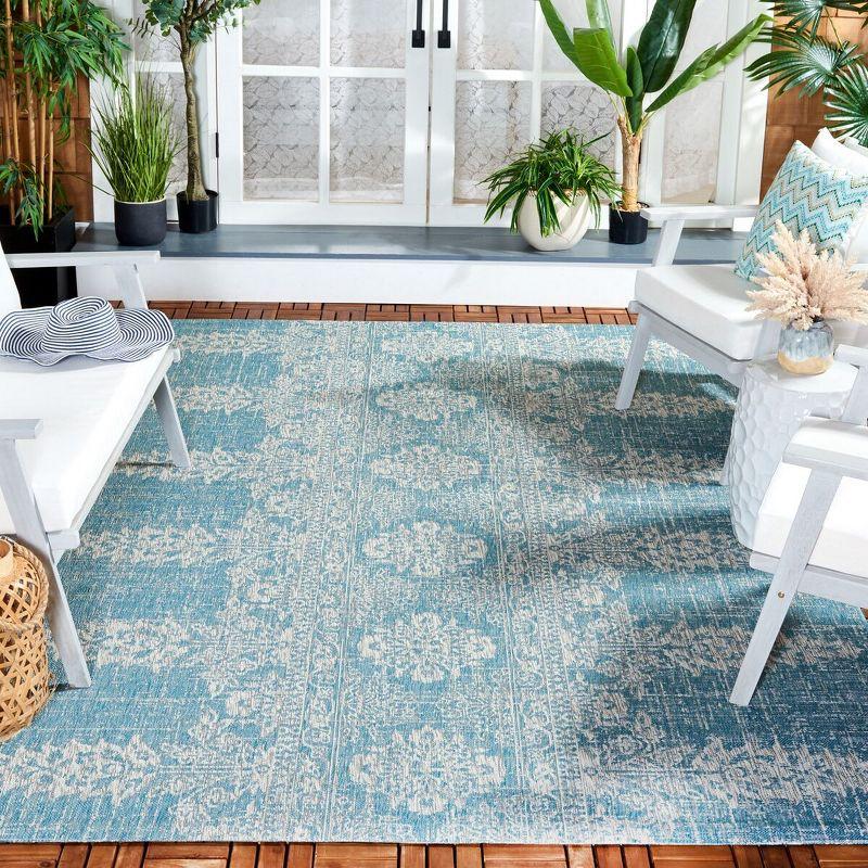 Aqua and Grey Synthetic Rectangular Indoor/Outdoor Area Rug