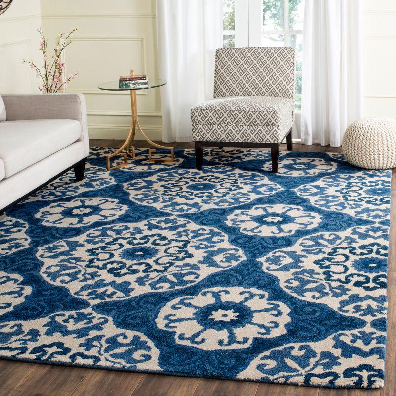 Handmade Blue and Ivory Wool Tufted 6' x 9' Rug