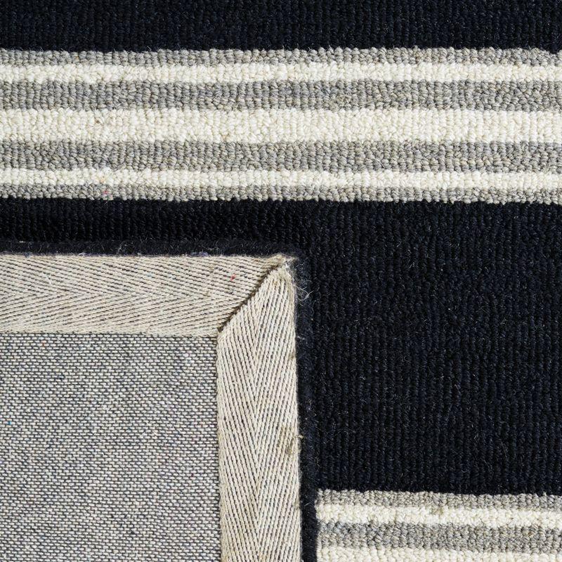 Metro MET601 Hand Tufted Indoor Area Rug - Black/Ivory - 5'x8' - Safavieh