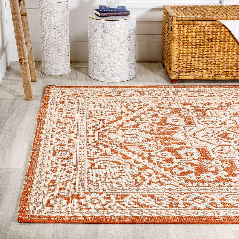 9' x 12' Sinjuri Medallion Textured Weave Indoor/Outdoor Area Rug, Orange/Cream - JONATHAN Y