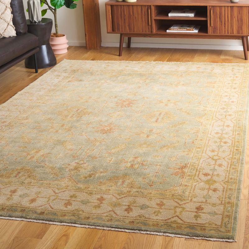 Elegant Ivory Wool 9' x 12' Hand-Knotted Oushak Area Rug