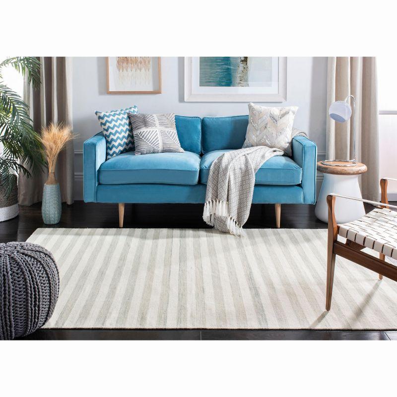 Elysian Light Blue and Ivory Handmade Wool 4' x 6' Area Rug