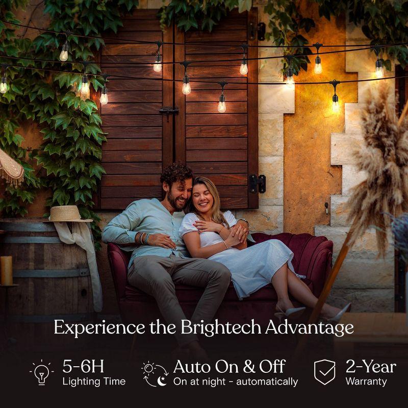 Brightech 12-Bulb LED AmbiencePro Solar Remote 1W 3000K Outdoor Hanging String Lights Clear Bulb Black Wire