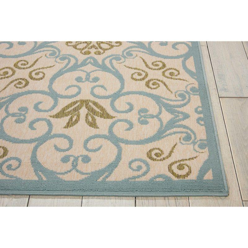 Ivory and Blue Floral Synthetic 9'3" x 12'9" Round Area Rug