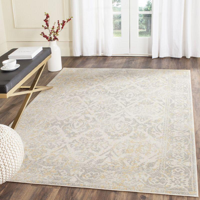 Ivory and Gray Synthetic Damask Area Rug with Border Embellishment